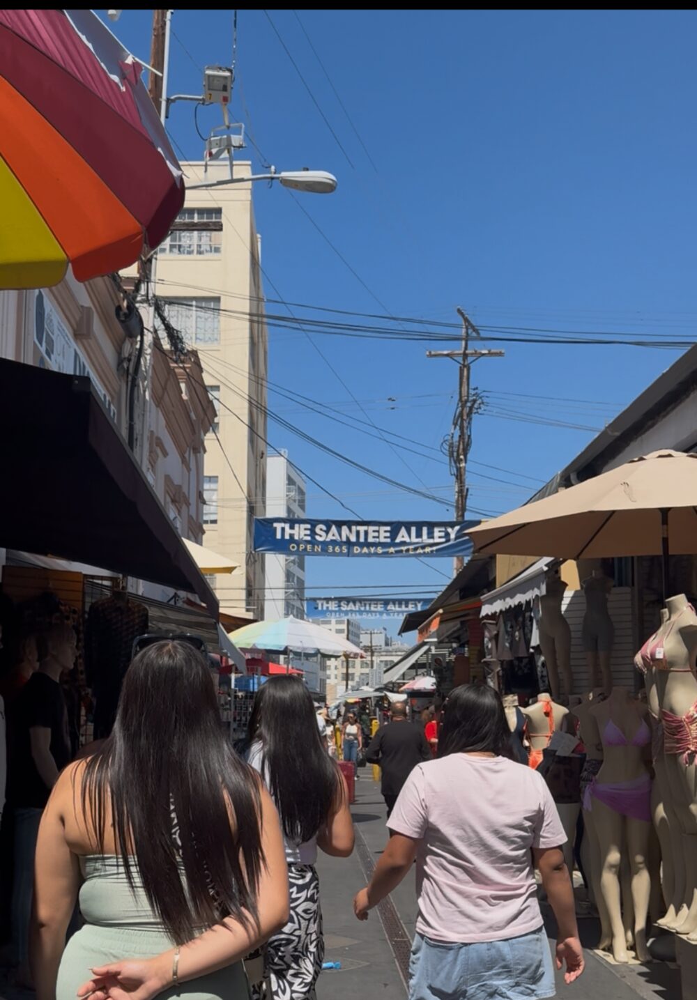 Looking down The Santee Alley toward the blue THE SANTEE ALLEY banner near 11th Street